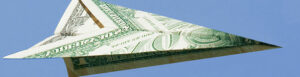paper airplane made with a dollar bill