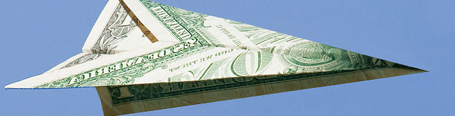 paper airplane made with a dollar bill